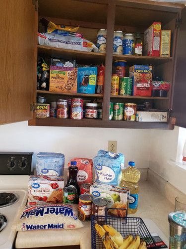 A kitchen cabinet filled with lots of food and drinks - Hickory, NC - Giving Kids Hope Foundation 