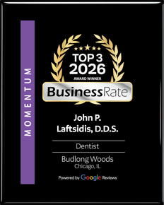 Award plaque for John P. Laftsidis, D.D.S., dentist. Top 3 in 2026. Includes a purple 