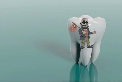 White tooth with cartoon hobo character on it, holding a bindle and giving a thumbs up.