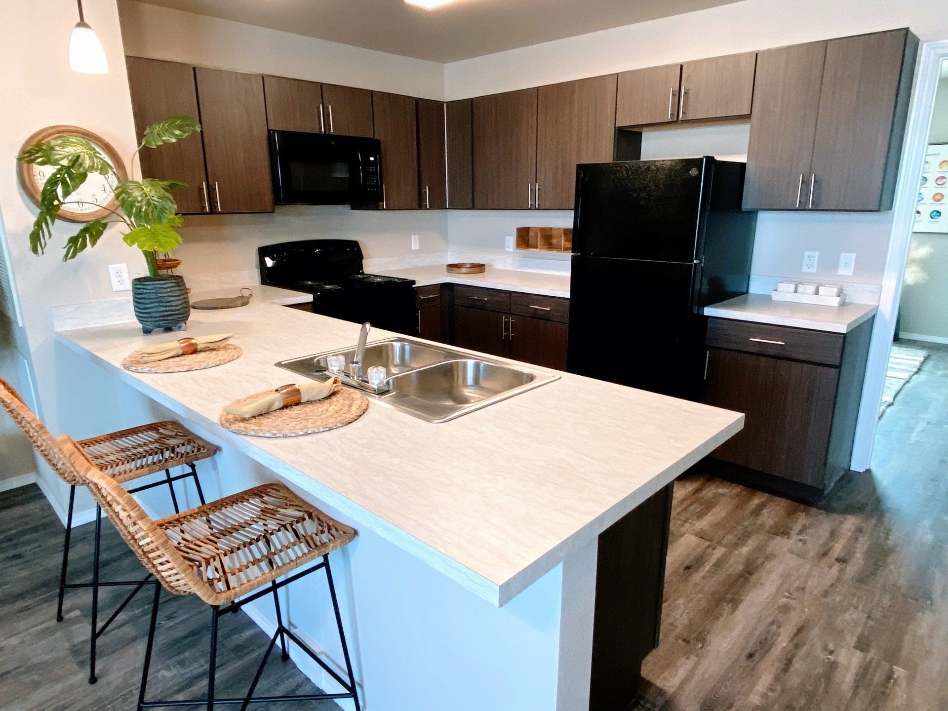 Modern kitchen with modern bar seating and bar chairs