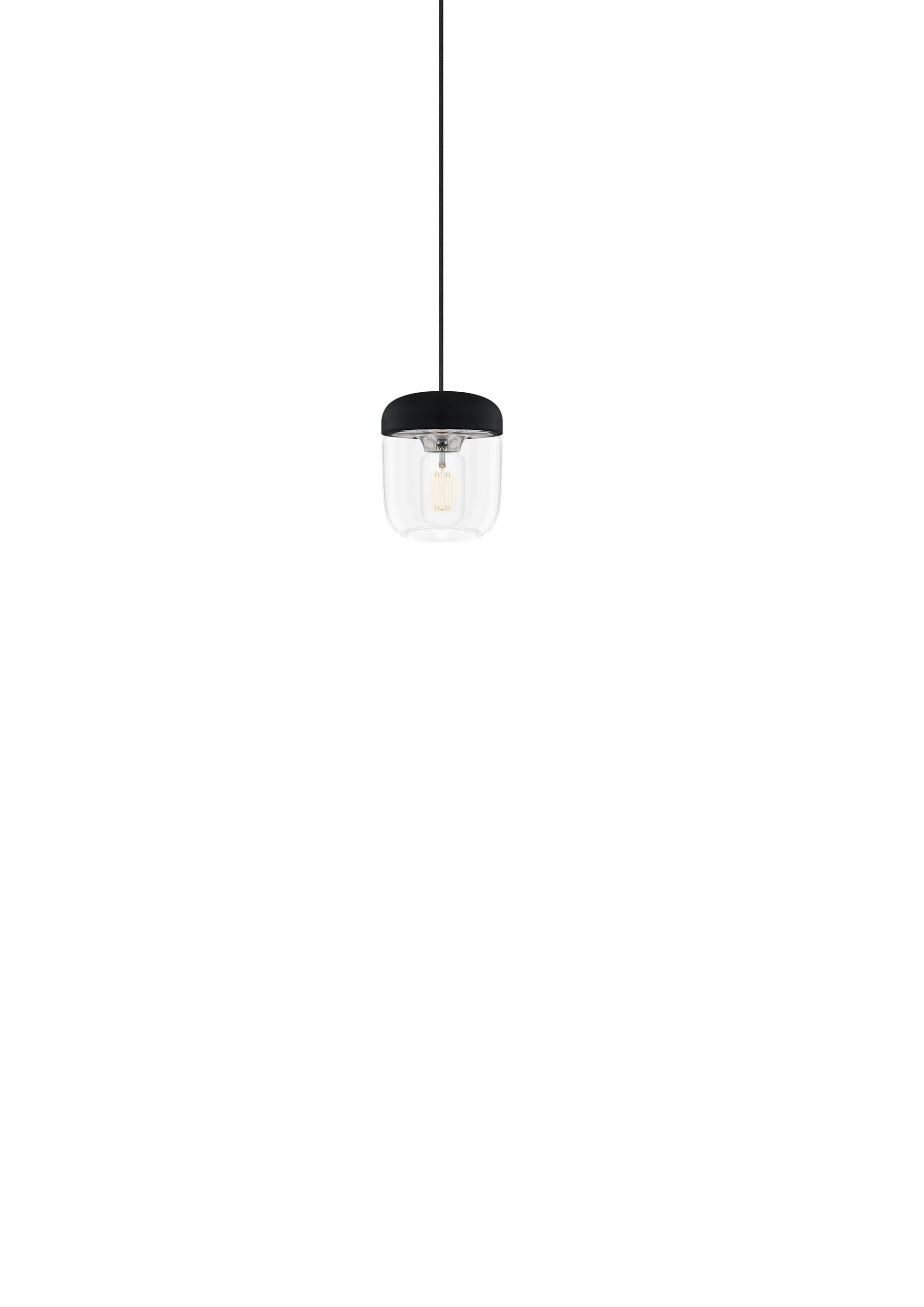 A pendant light with a clear glass shade is hanging from a ceiling.