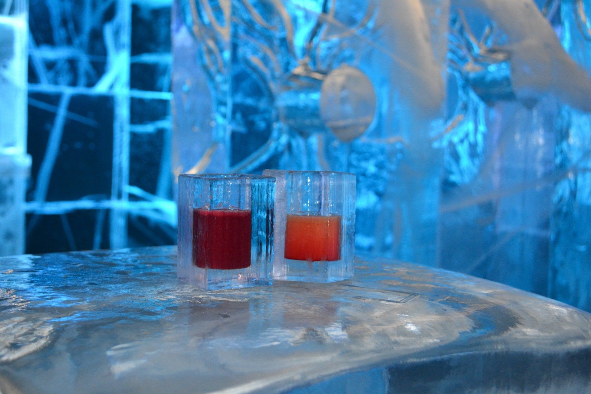 Ice bar with red and orange cocktails