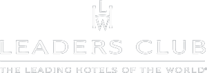 A white logo for leaders club , the leading hotels of the world.