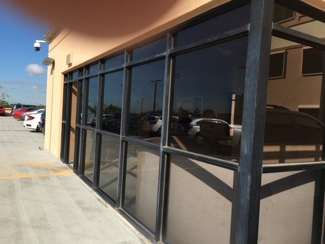 Commercial Building With Black Window — Miami, FL — Solar Tint, Inc.