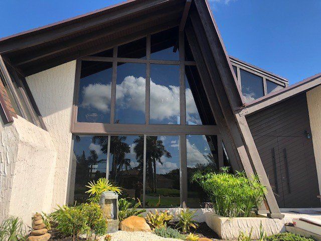 Triangular Shape House With Window Tinting — Miami, FL — Solar Tint, Inc.