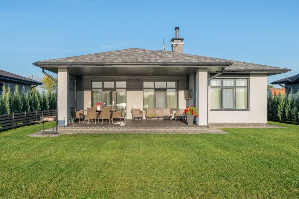 A house with decorative window film applied to its windows.