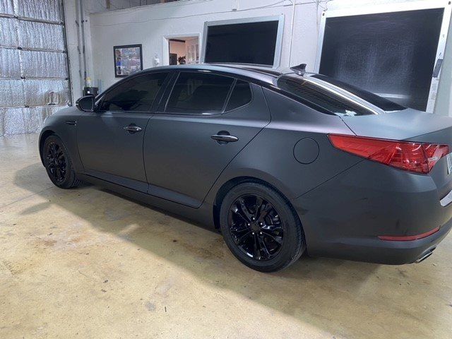 Car With Wraps And Tinted Glass — Miami, FL — Solar Tint, Inc.