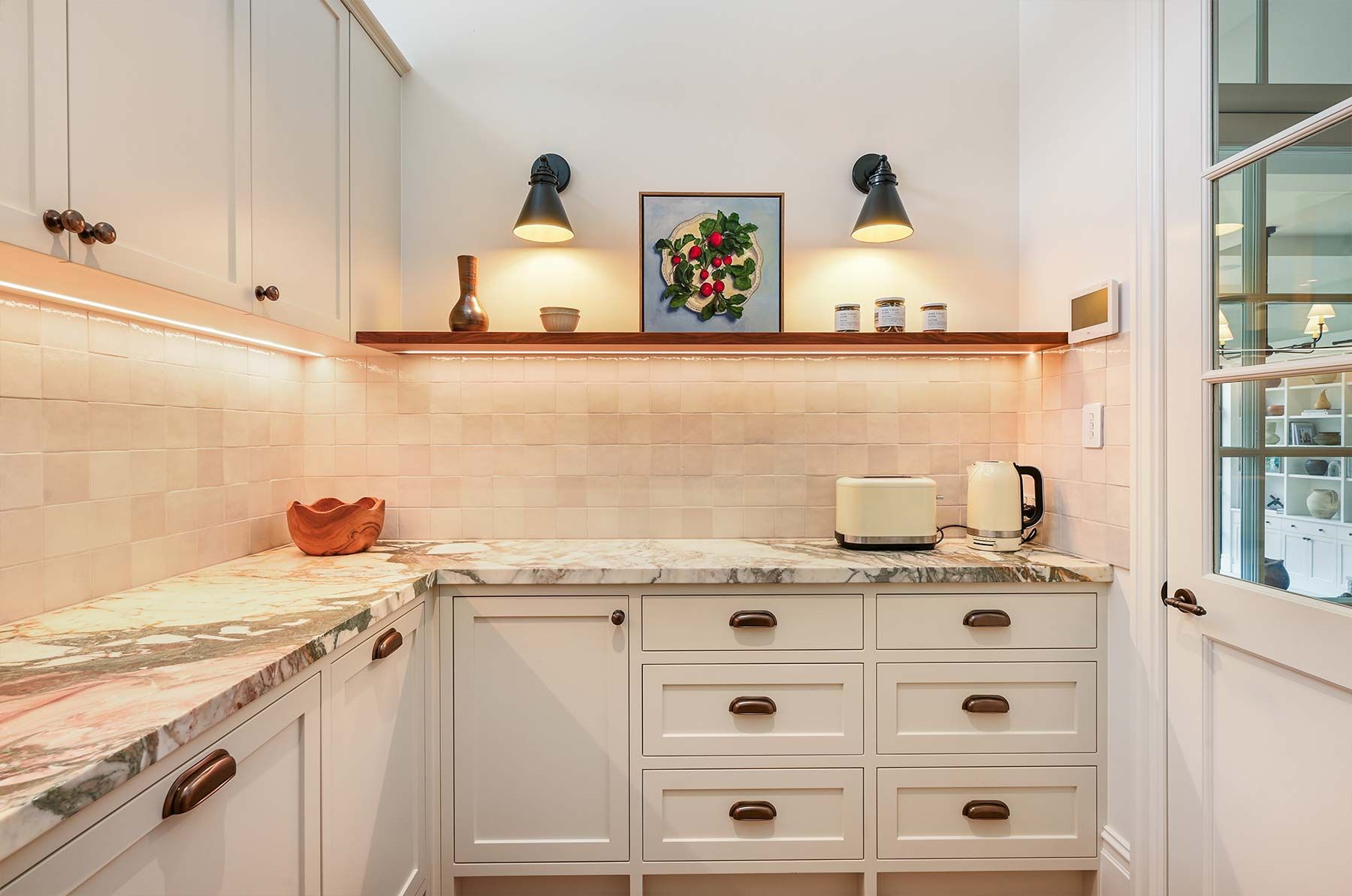 Small White Kitchen With Granite Countertops and Wooden Shelf — PK Kitchen Design in West Ipswich, QLD