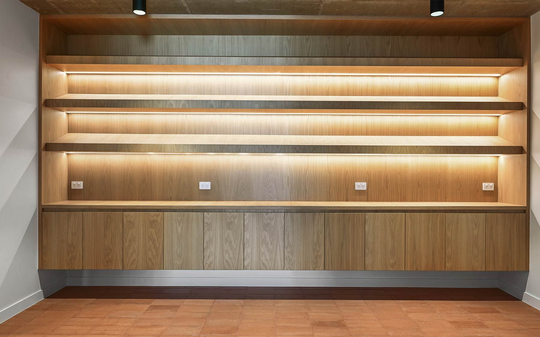 Wooden Built-in Shelving Unit With Illuminated Shelves — PK Kitchen Design in West Ipswich, QLD