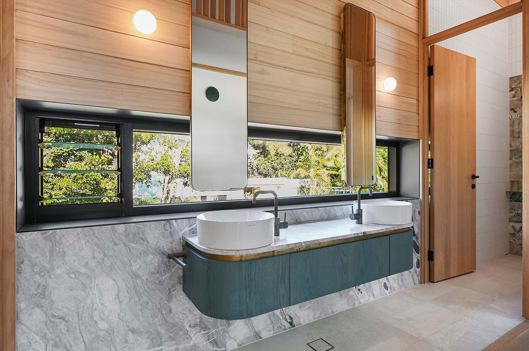 Modern Bathroom With Light Wood Paneling — PK Kitchen Design in West Ipswich, QLD