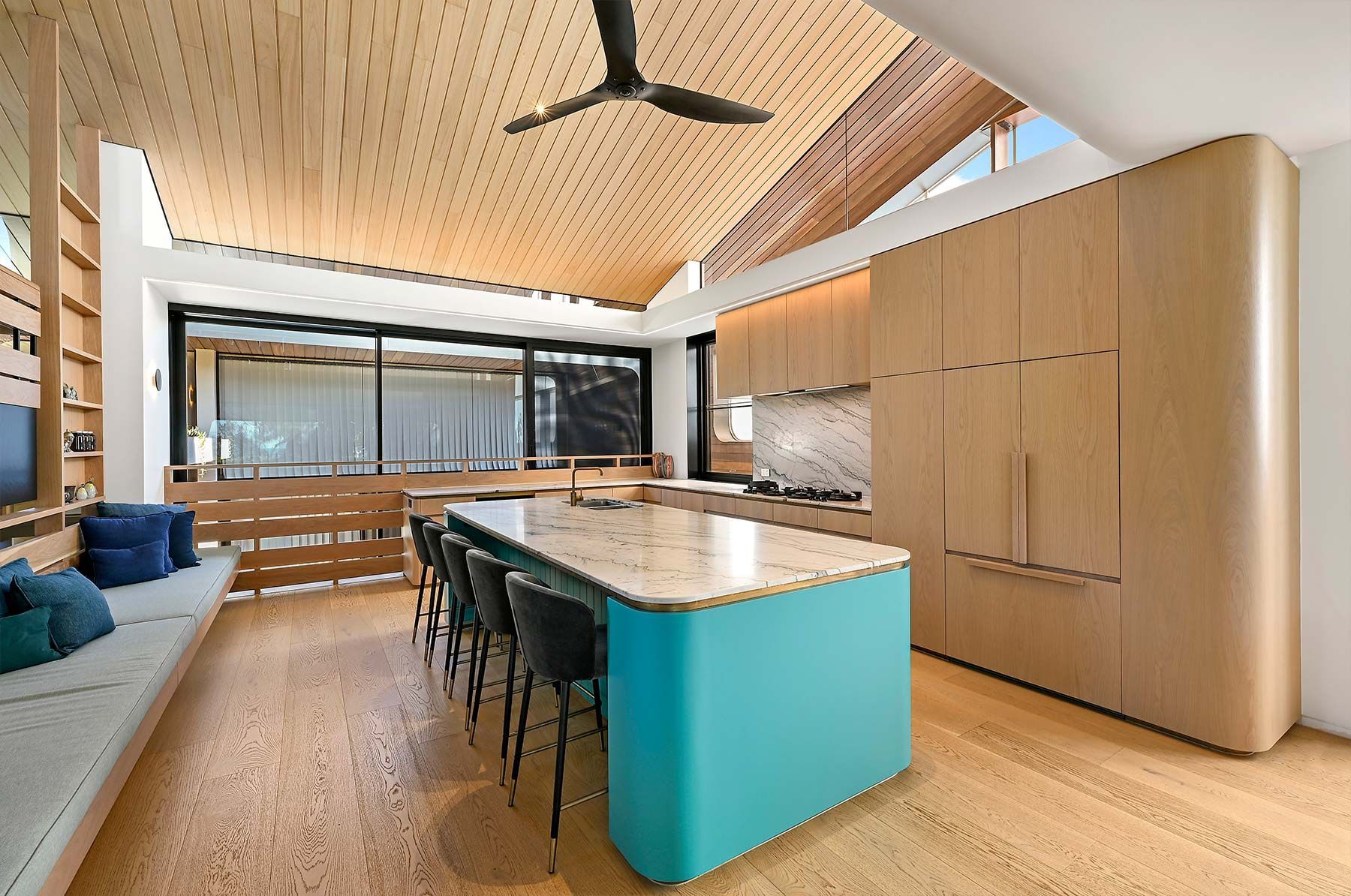 Modern Kitchen With Teal Island, Wood Cabinets — PK Kitchen Design in West Ipswich, QLD