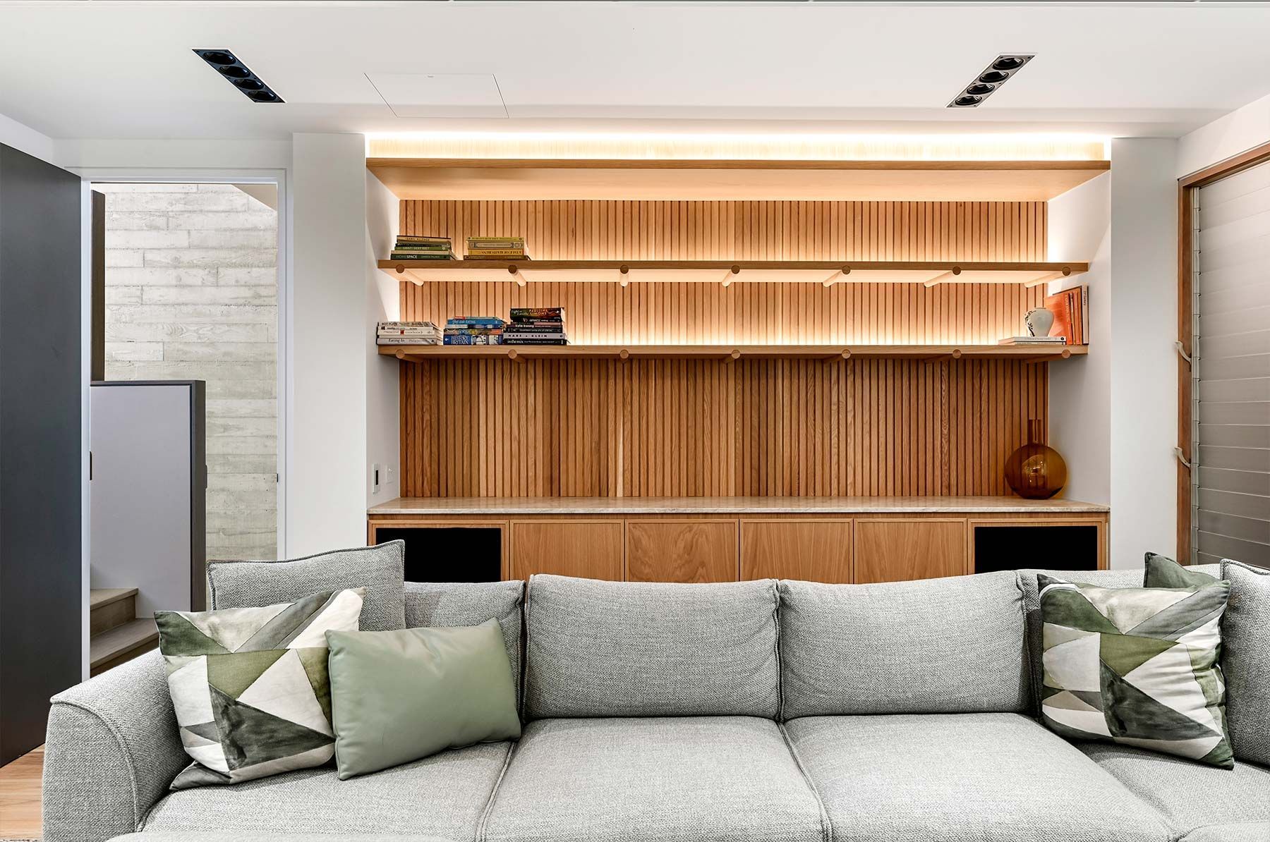 Cozy Living Room With a Light Gray Sofa — PK Kitchen Design in West Ipswich, QLD