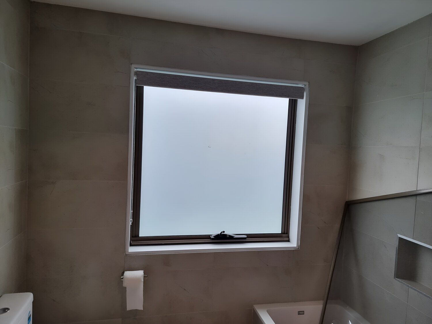 A Bathroom With A Window And A Toilet — Solartint South Coast (Juz Tint) In Batemans Bay, NSW