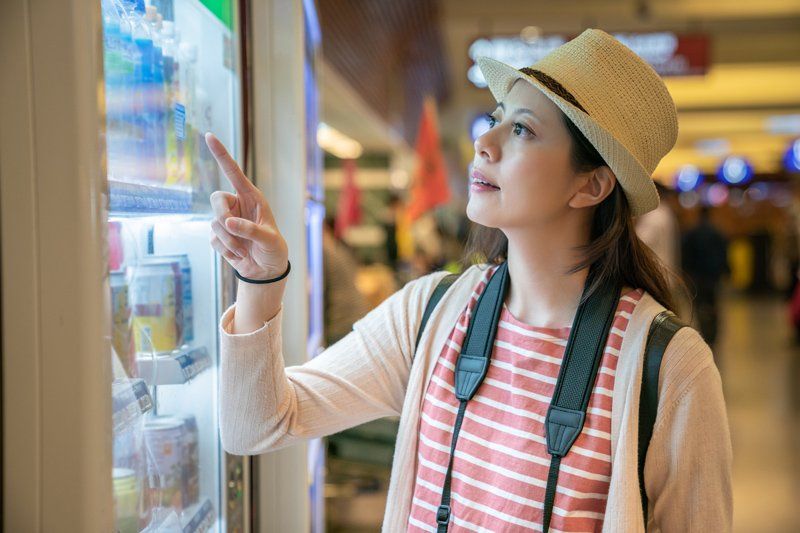 Blue Collar Vending Machines — Woman with Hat in Charlotte, NC