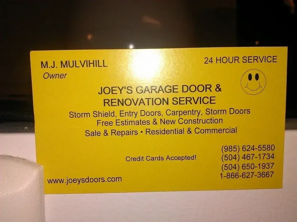 Yellow business card for Joey's Garage Door & Renovation Service, lists services and contact info.