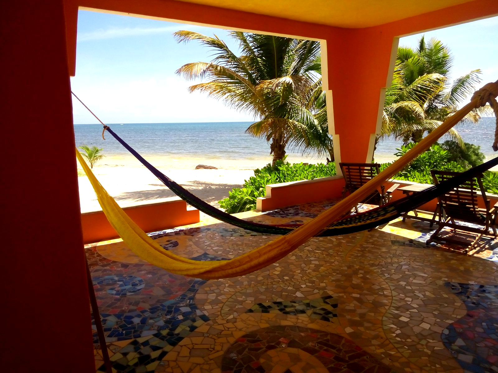 Mosaic patio with hammocks of Beachfront King