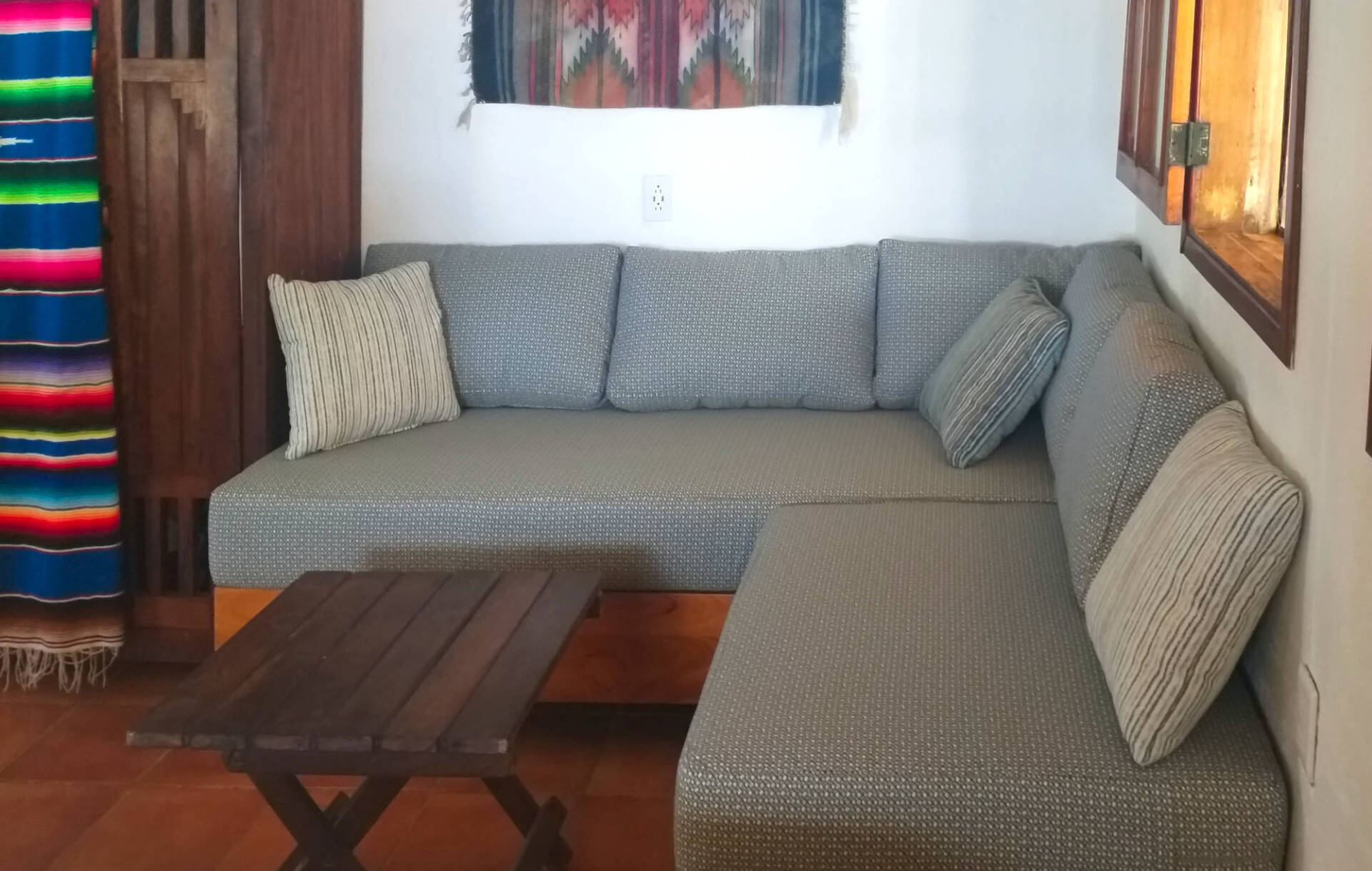 L -shaped couch in unit 2
