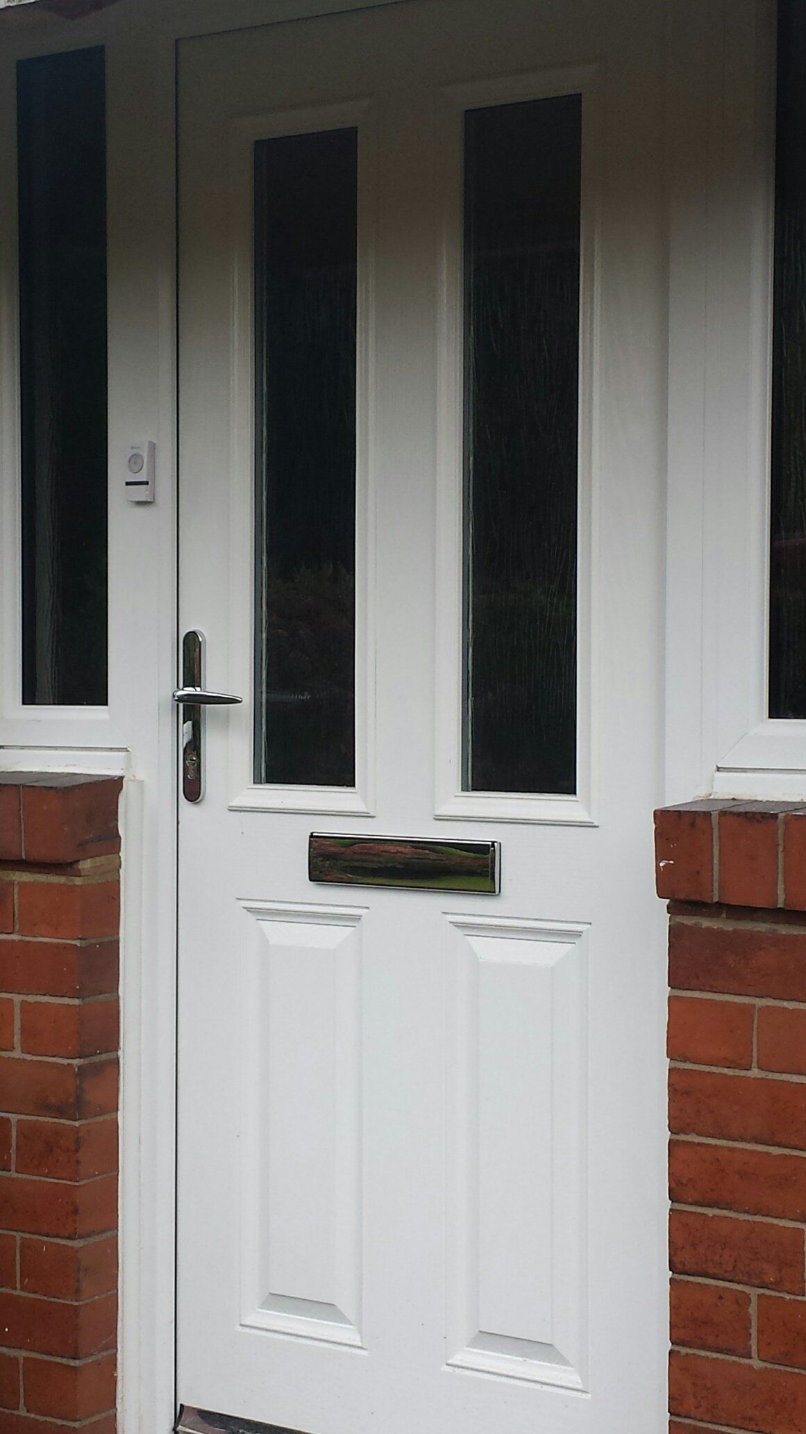 white composite door with side windows