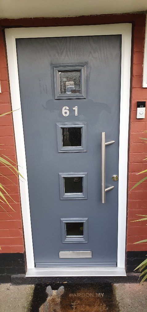 grey composite door with bar handle