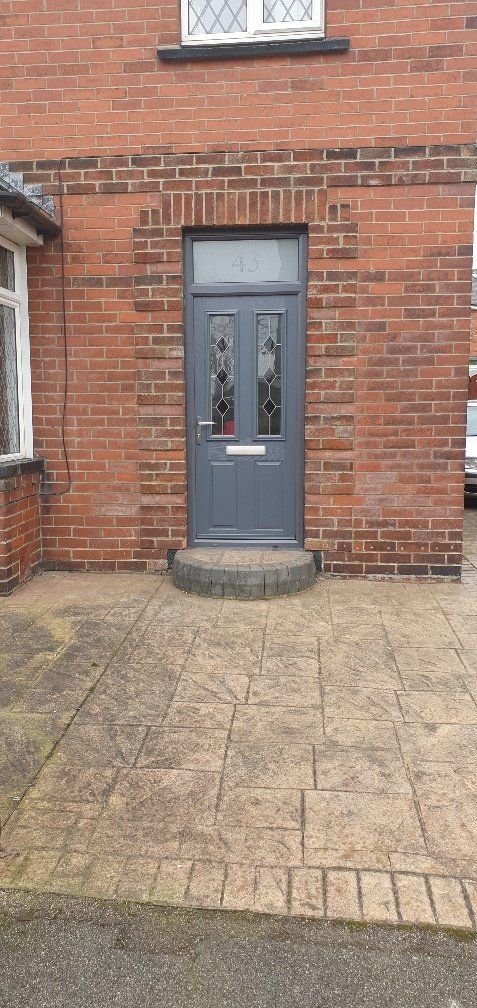 twin panel grey door with leaded diamonds
