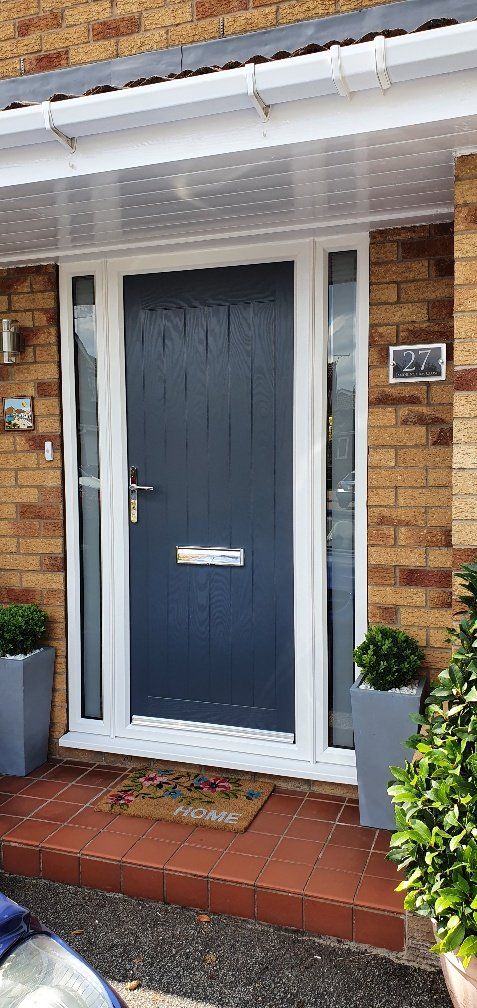 grey door with twin side glass panels