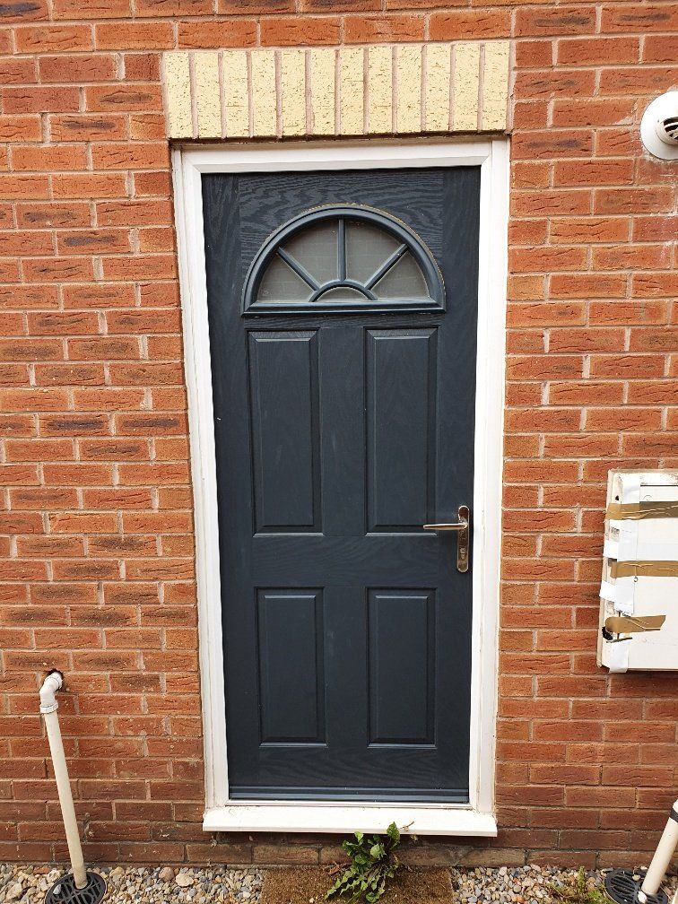 A black door with a white frame 