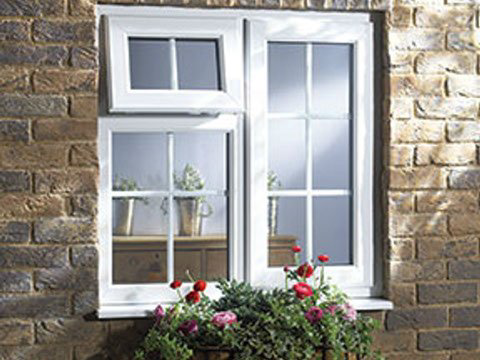 white casement window with georgian bars