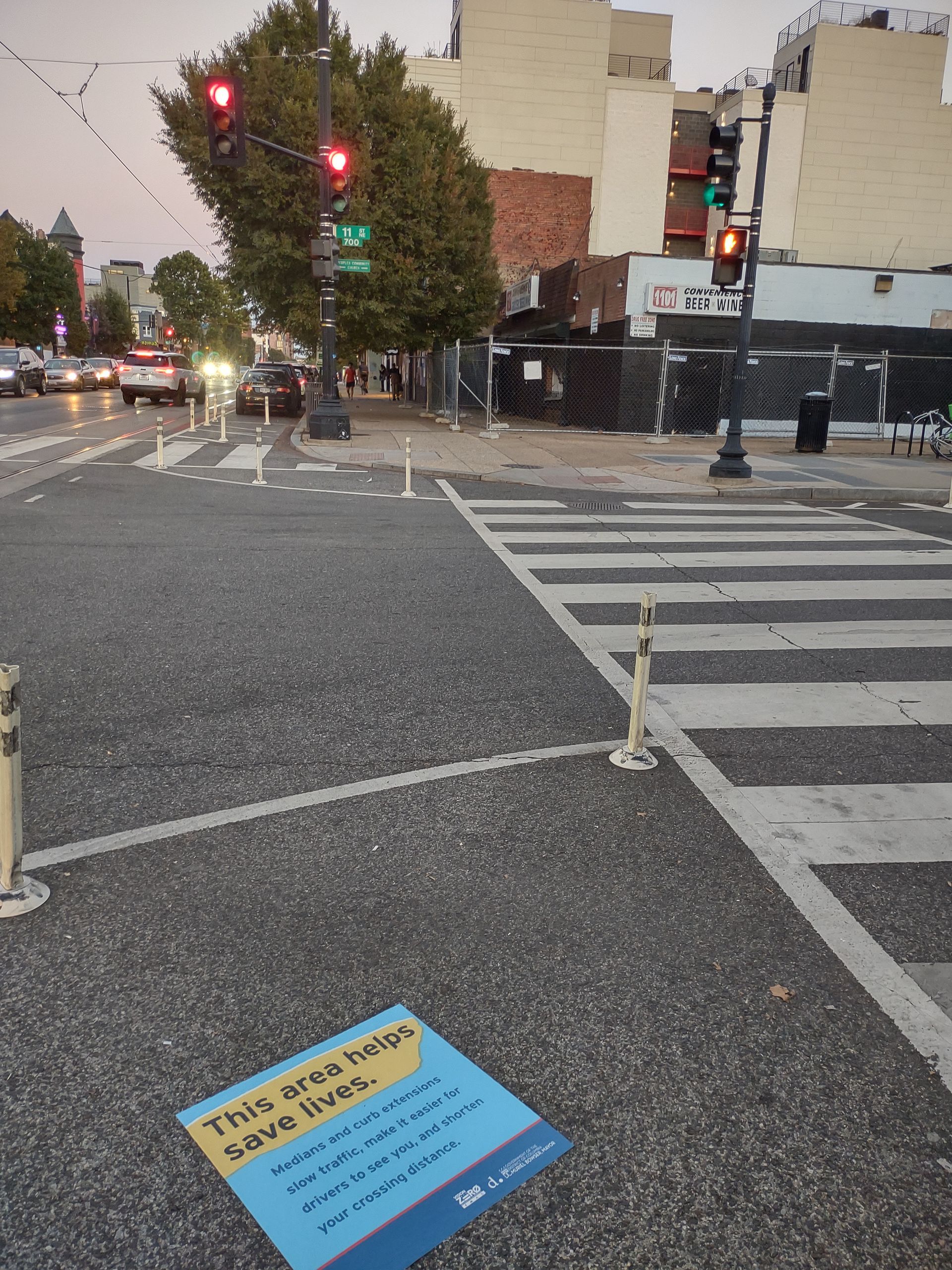 A sign on the side of a road that says to stay on the right lane