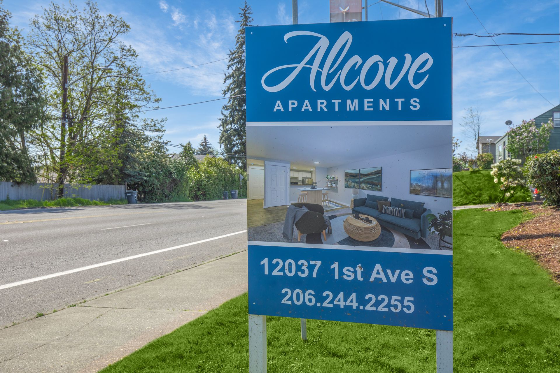 A blue sign that says above apartments on it