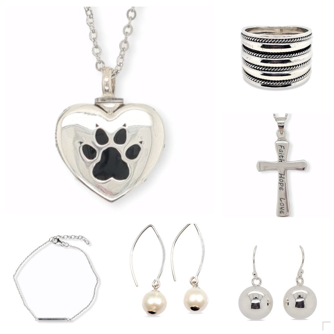 Assortment of silver jewelry: heart pendant, cross pendant, rings, earrings, and bracelet.— Rockhampton Crematorium in Norman Gardens, QLD