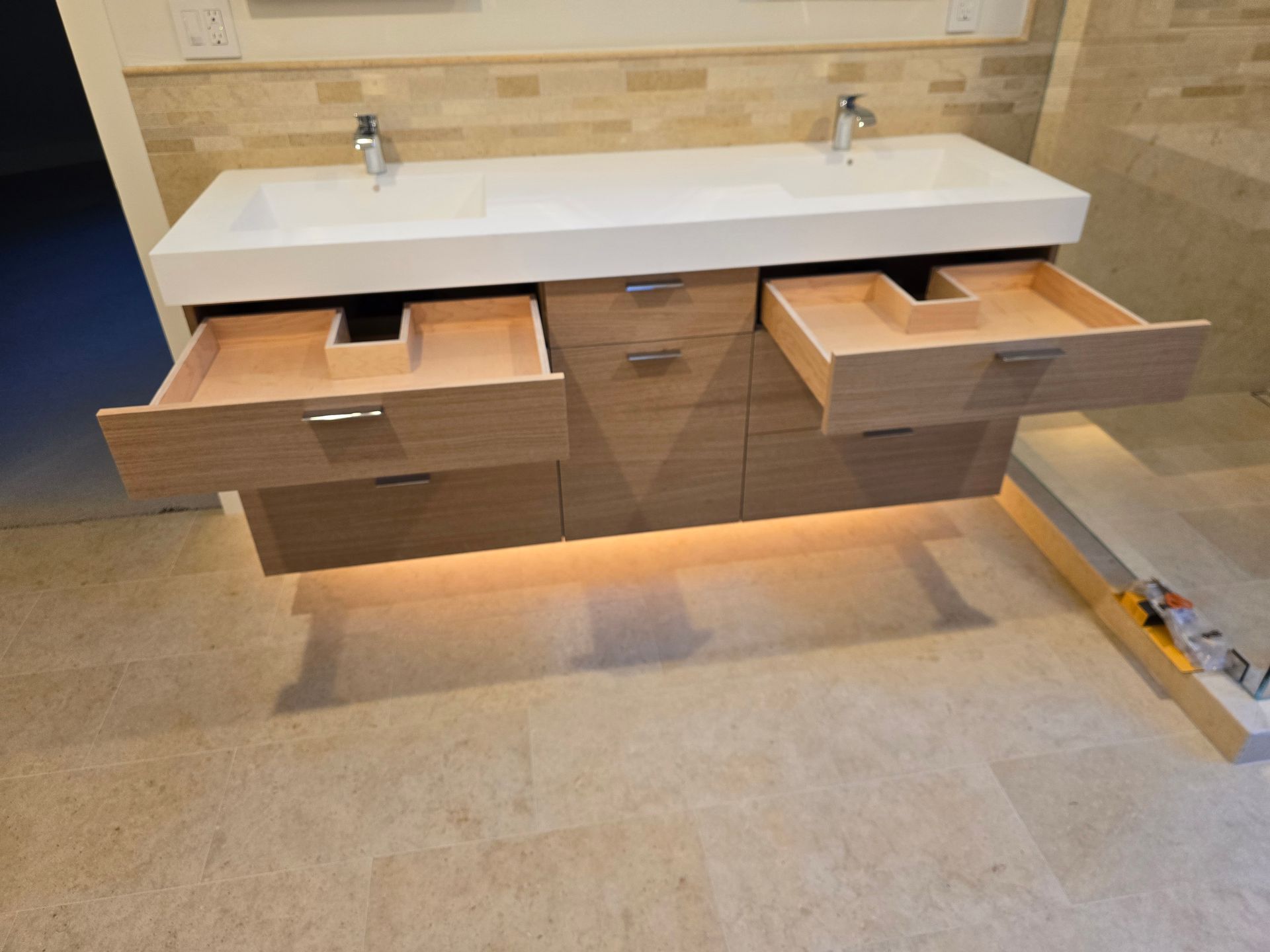 A bathroom with a bathtub , sink , toilet and mirror.