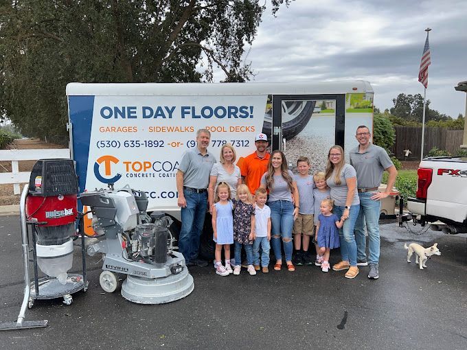 Technician smoothing out concrete floor