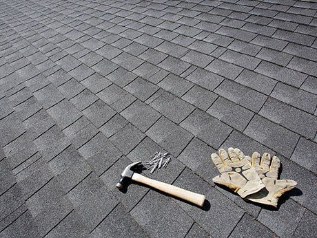Hammer and Nails on the Roof — Renton, WA — BR Roofing Inc