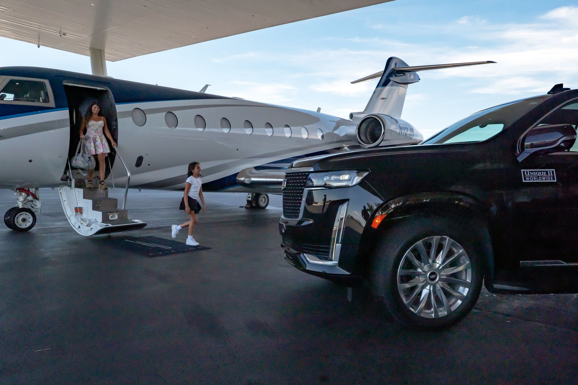 Family Going Down a Airplane - Teterboro, NJ - Unique II Worldwide