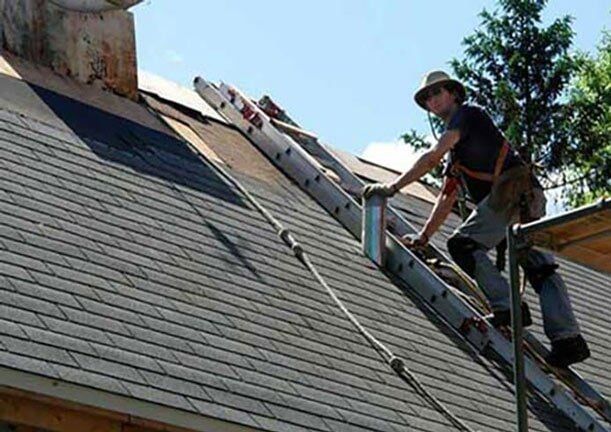 Man on the Roof — Quality Roofing in Derry, NH