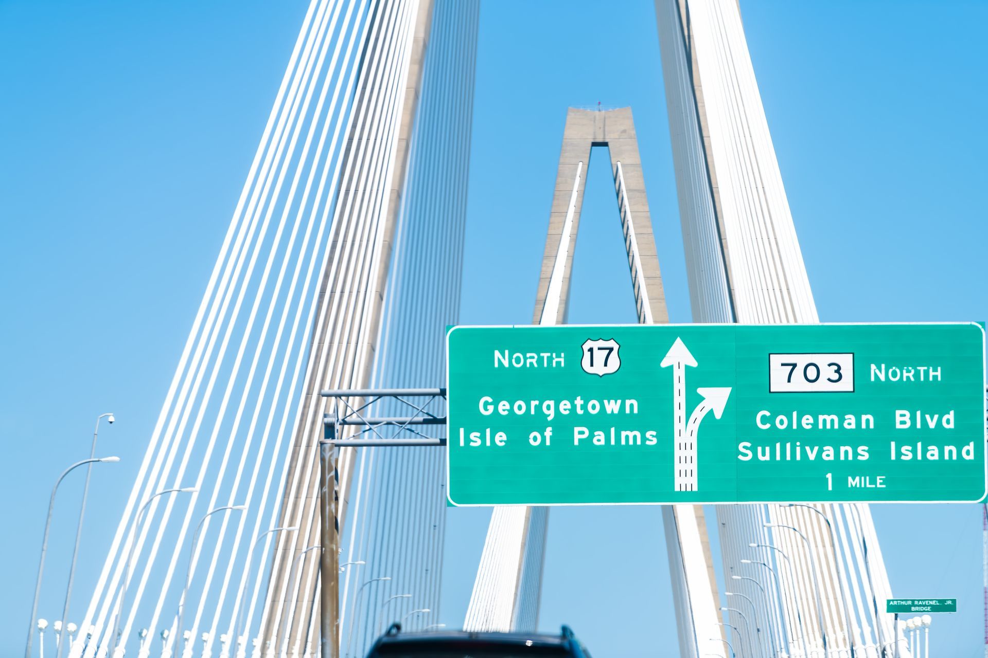 A green highway sign that says north 17 on it