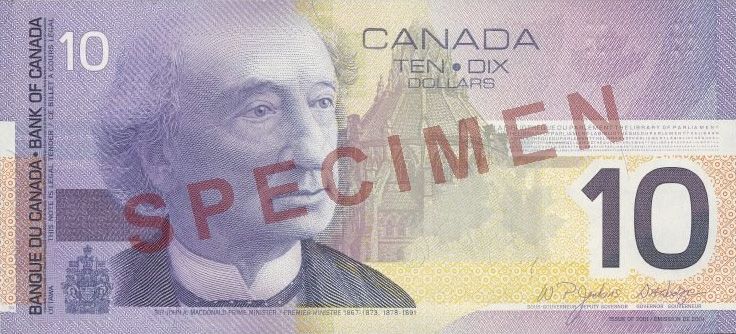 A canadian ten dollar bill with a picture of george washington on it