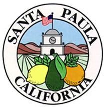 The seal of santa paula california shows a clock tower and fruit.