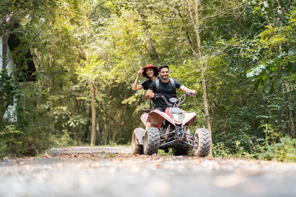 Couple Riding ATV — Hampton, NH — Hampton Bay Insurance Agency