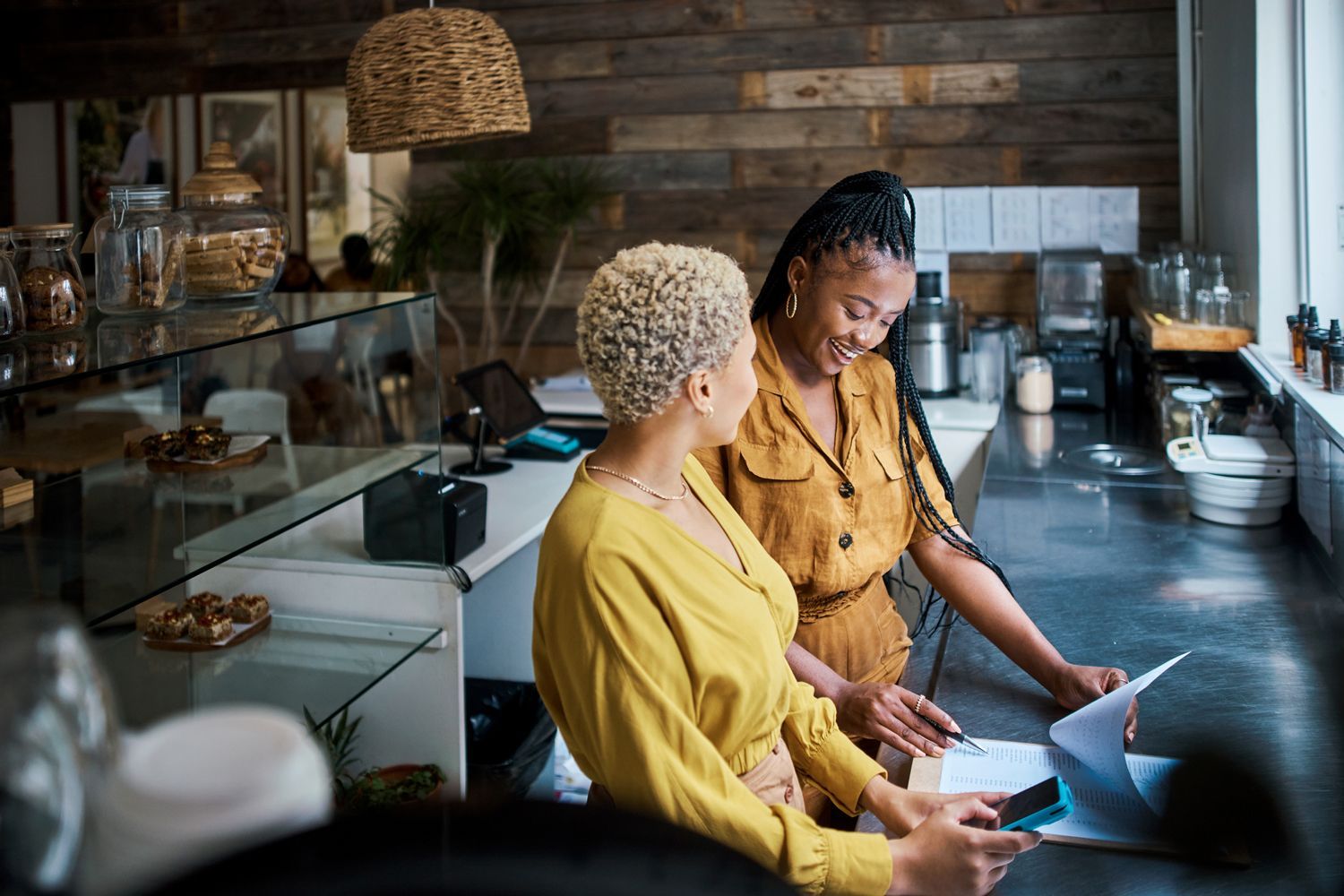 Two Woman Inside A Small Business — Hampton, NH — Hampton Bay Insurance Agency
