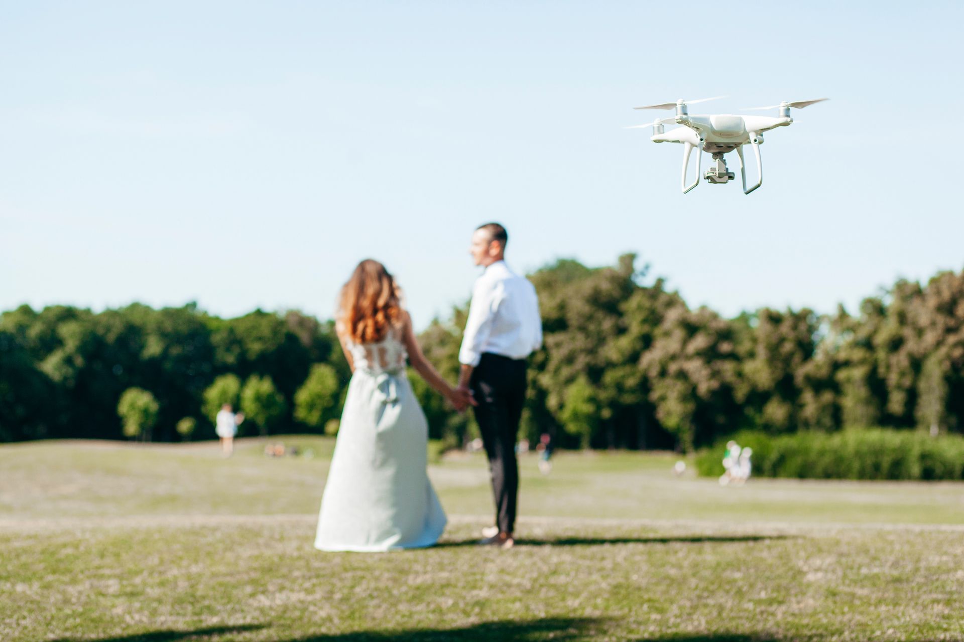 Picture of a drone engaging in wedding photography by Affordable Drone Photography Modesto in California.
