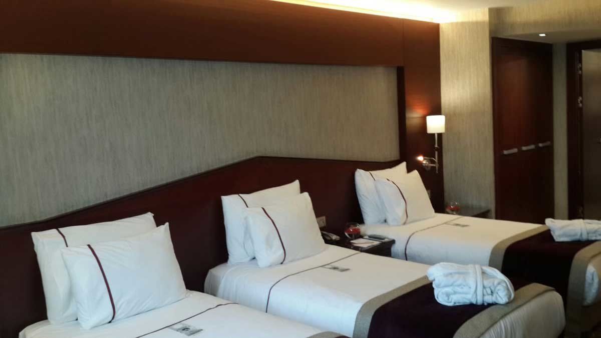 Taksim Gonen Hotel Triple Room Bed