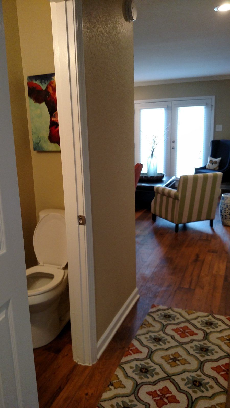 Hallway with restroom | The Meadows of Centerville