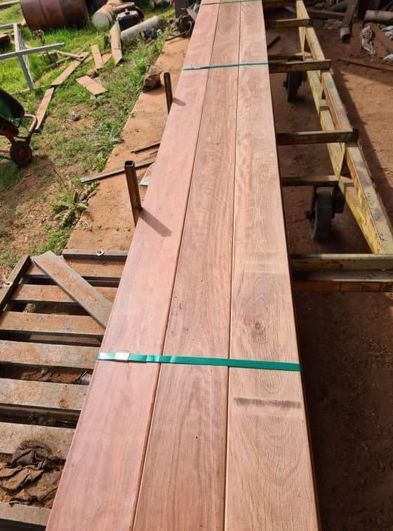 A Long Piece Of Wood Is Sitting On Top Of A Cart — Eungella Sawmill In Crediton, QLD