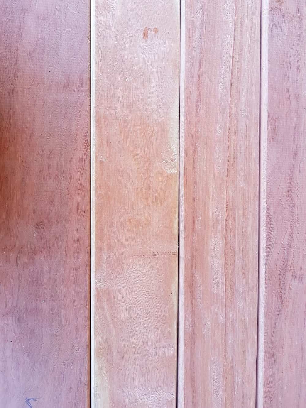 A Close Up Of Three Pink Tiles On A Wall — Eungella Sawmill In Crediton, QLD