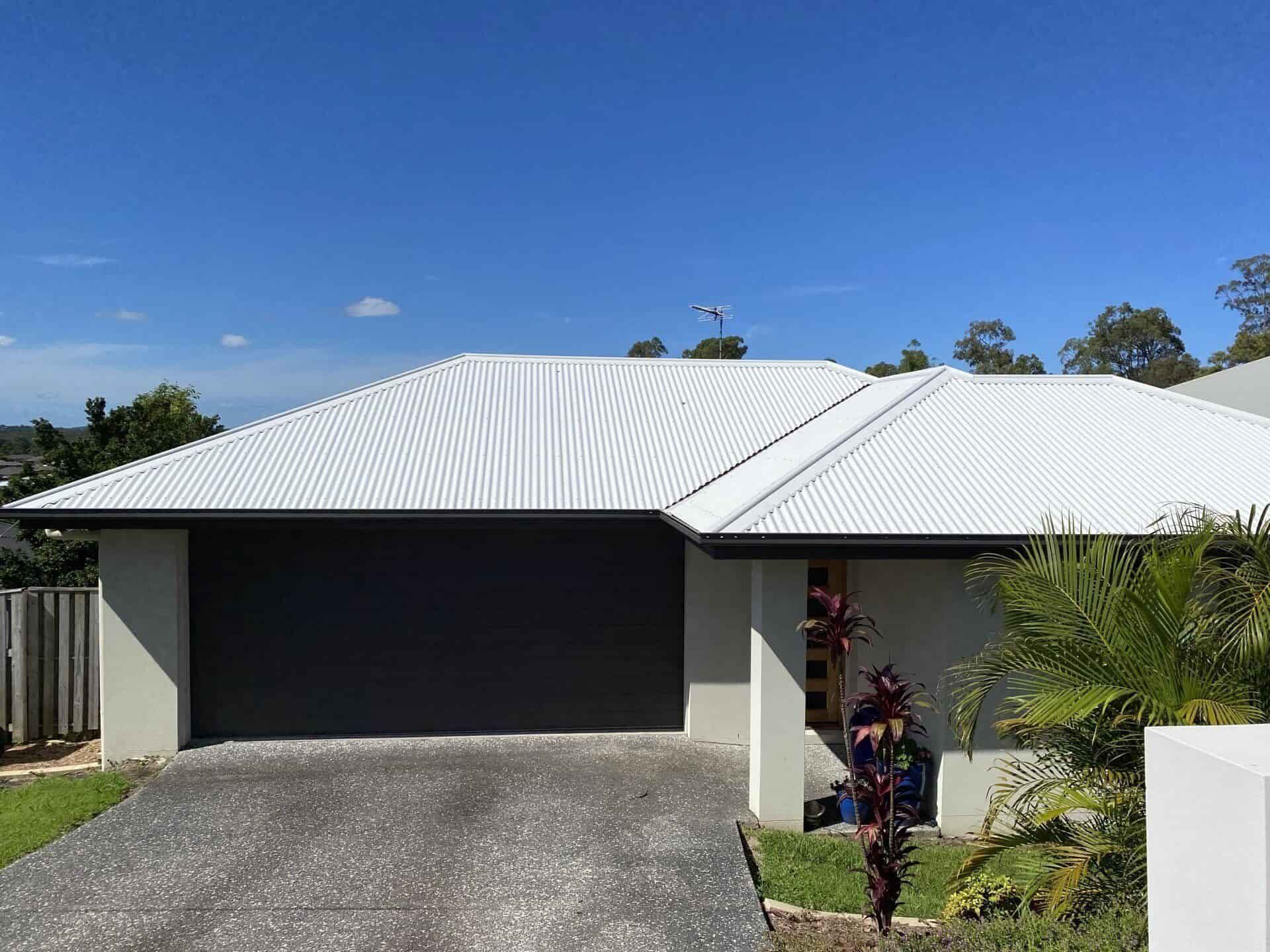 A Before and After Picture of a House That Has Been Remodeled — Goulburn Roofing In Goulburn, NSW