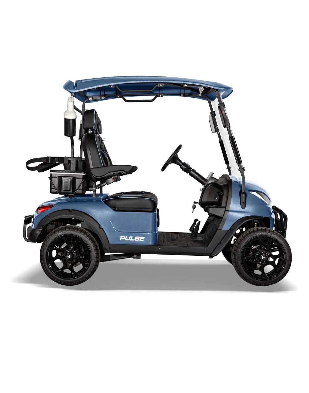 White golf cart with black accents, large tires, and windshield.