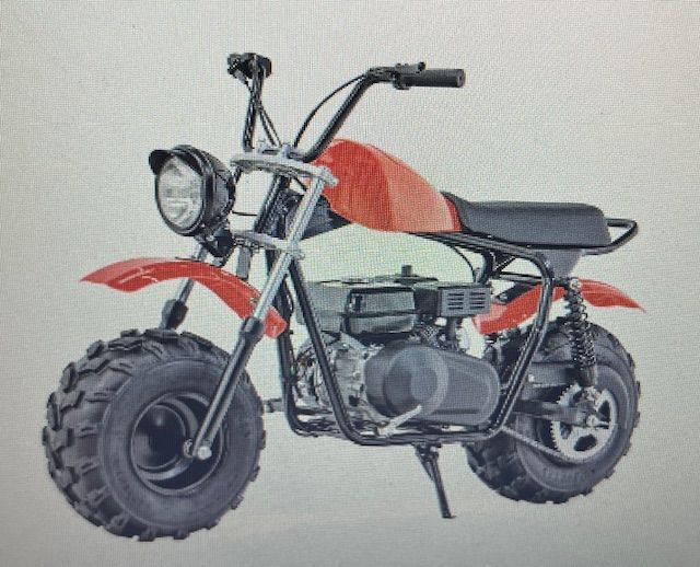 Red and black mini-bike with a round headlight and knobby tires on a neutral background.