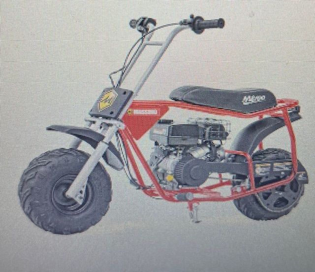 Red and silver mini bike on a light background with a black seat and tires.