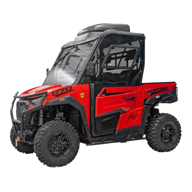 Red and black off-road utility vehicle with roll cage and large tires, side view on white background